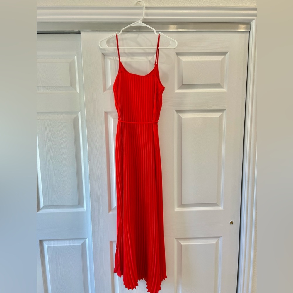 Red pleated maxi dress